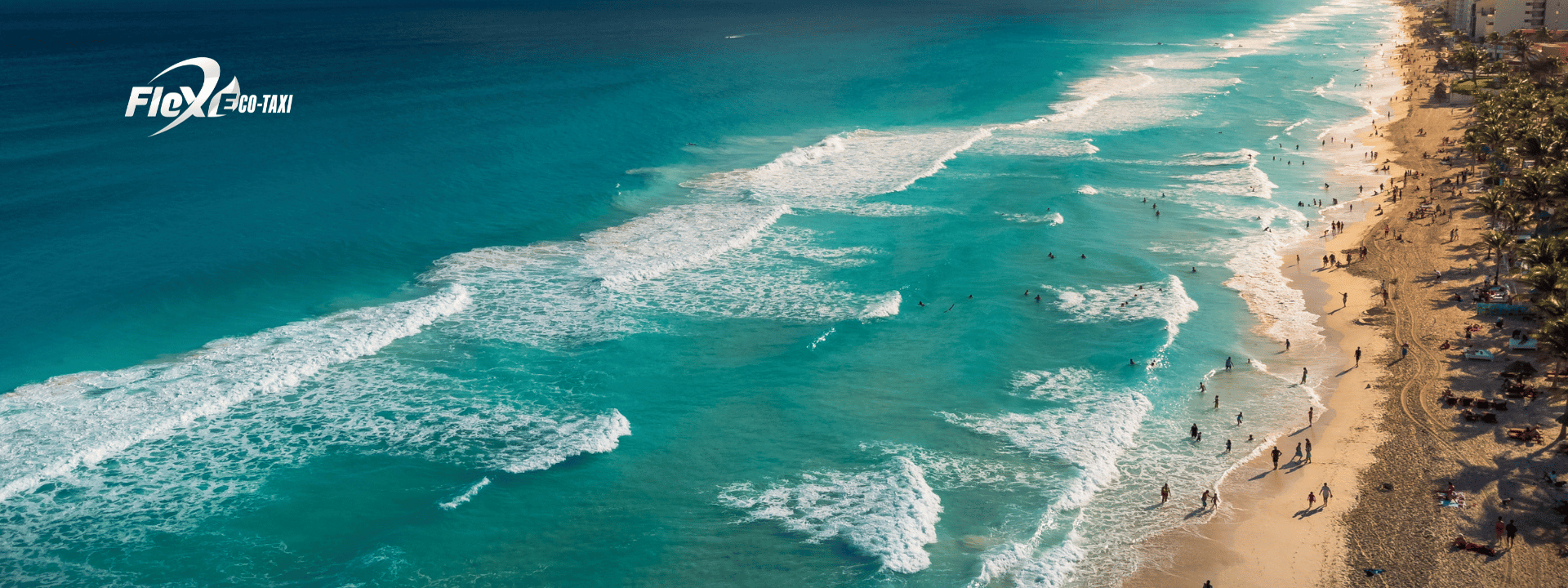 A scenic view of Playa Delfines in Cancun with white sand and turquoise waters, perfect for sunbathing and surfing. Arrive with Flex Eco Taxi for a smooth ride