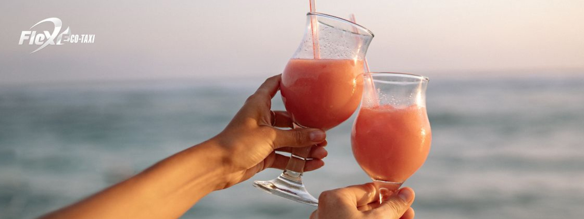 Refreshing cocktails served by the beach in Tulum, offering a perfect spot to unwind with ocean views. Travel comfortably to this seaside paradise with Flex Eco Taxi