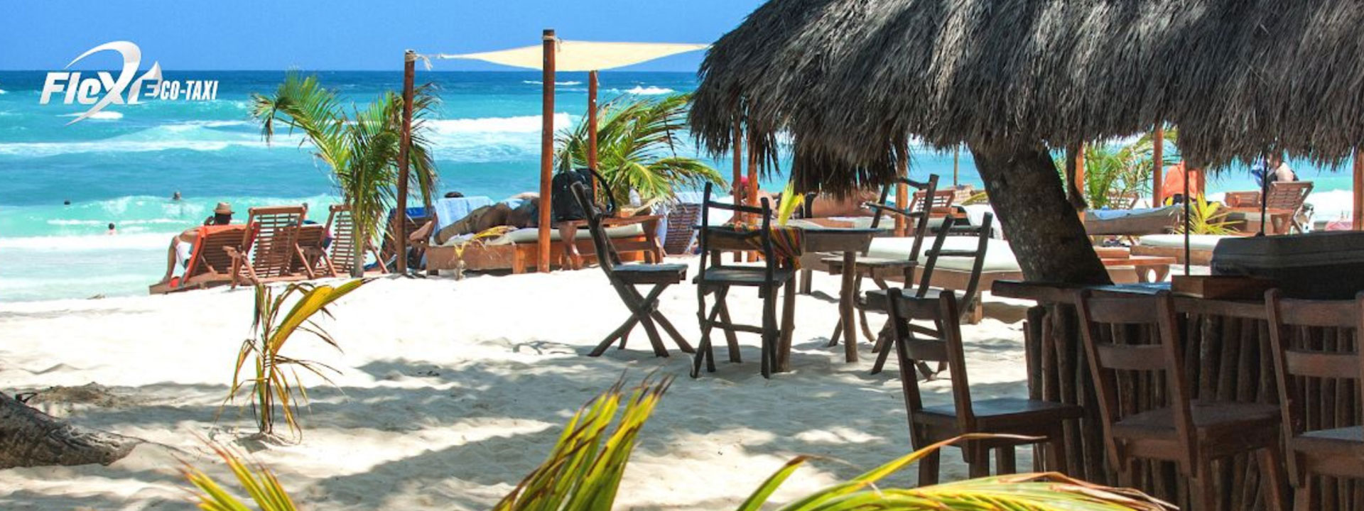 Beautiful beachfront setting in Tulum with ocean views, an ideal spot for lunch. Travel easily with Flex Eco Taxi to this stunning destination.