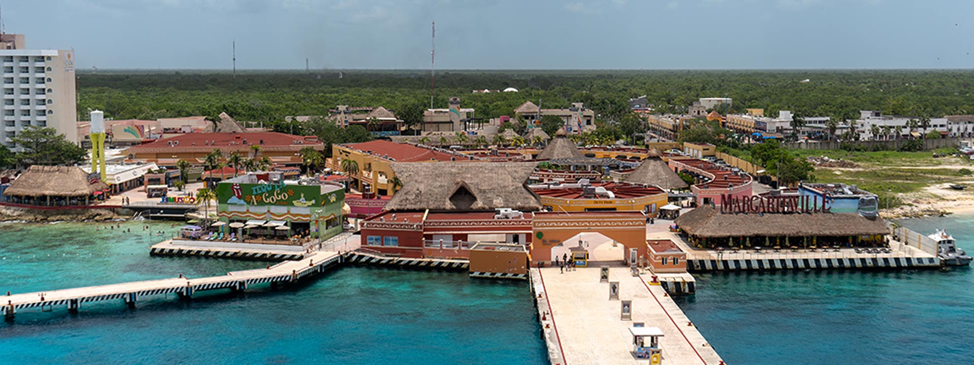 A breathtaking panoramic view of Cozumel, showcasing the beautiful landscape of the island and the surrounding waters.